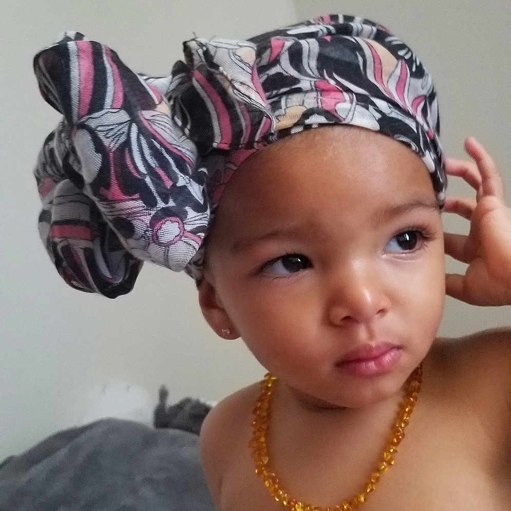 Jamilah joined the competition — help win amazing prizes! cap, child, fashion_accessory, forehead, girl, hair_accessory, hat, headgear, headpiece, headwear, person, pink, toddler