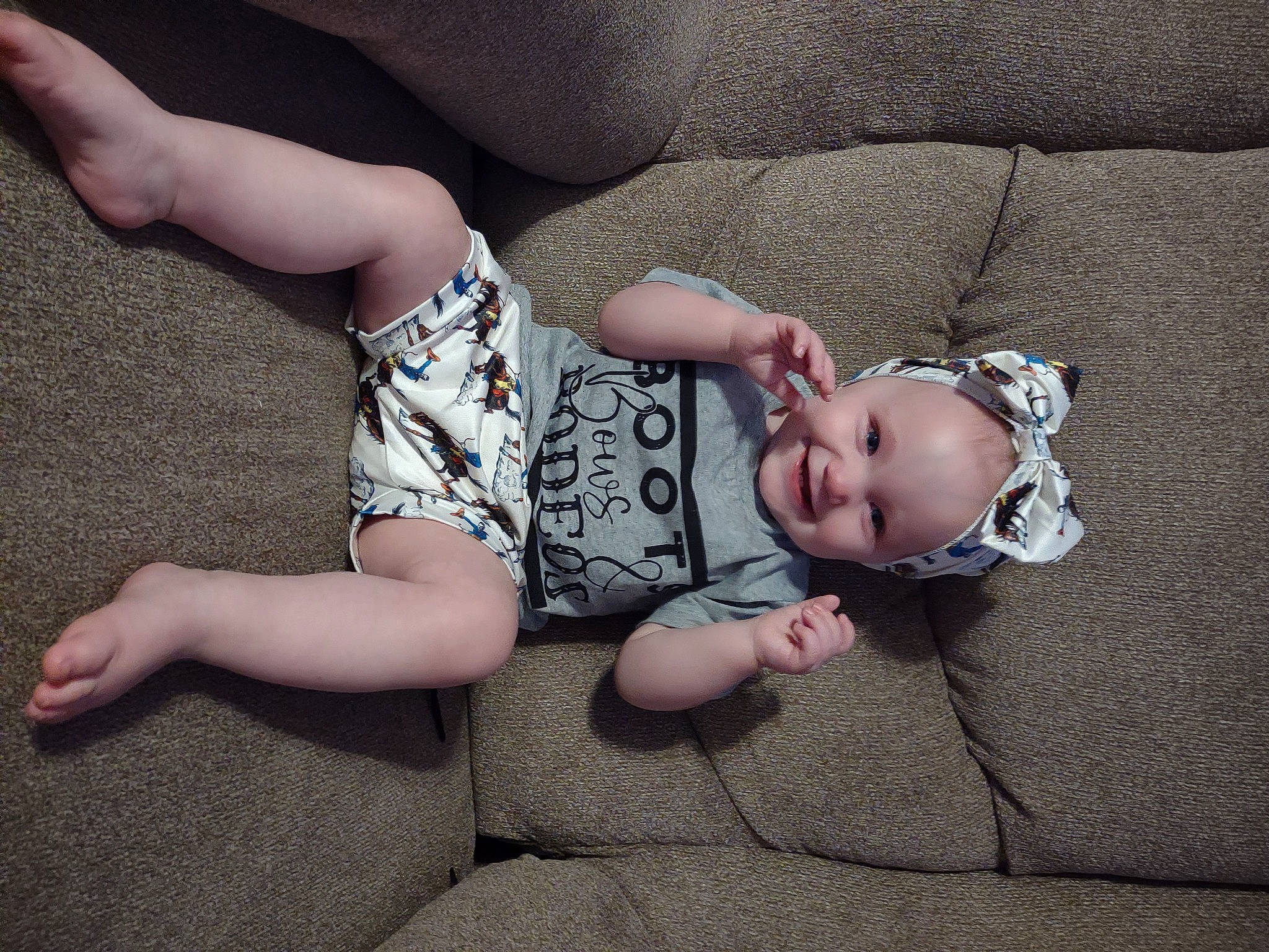 Coramarie joined the competition — help win amazing prizes! arm, baby, baby_toddler_clothing, child, comfort, finger, foot, grass, grey, human_leg, joy, knee, linens, pattern, person, sitting, skin, sleeve, sock, thigh