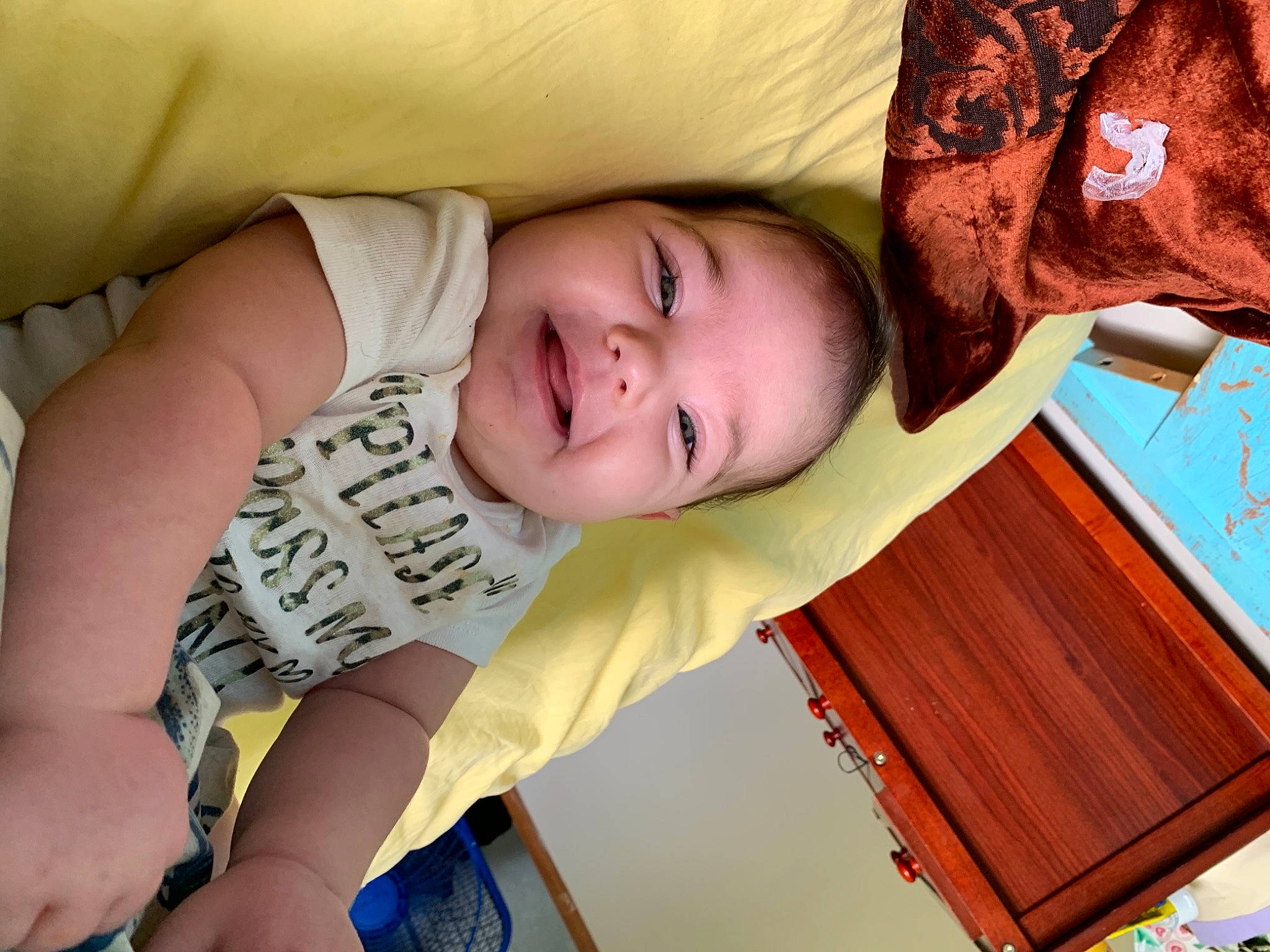 Loghyn is registered to the contest to win money with this photo: baby_toddler_clothing, blue, cheek, comfort, eye, facial_expression, hairstyle, hand, happy, head, human, human_body, mouth, neck, nose, organ, person, product, skin, smile