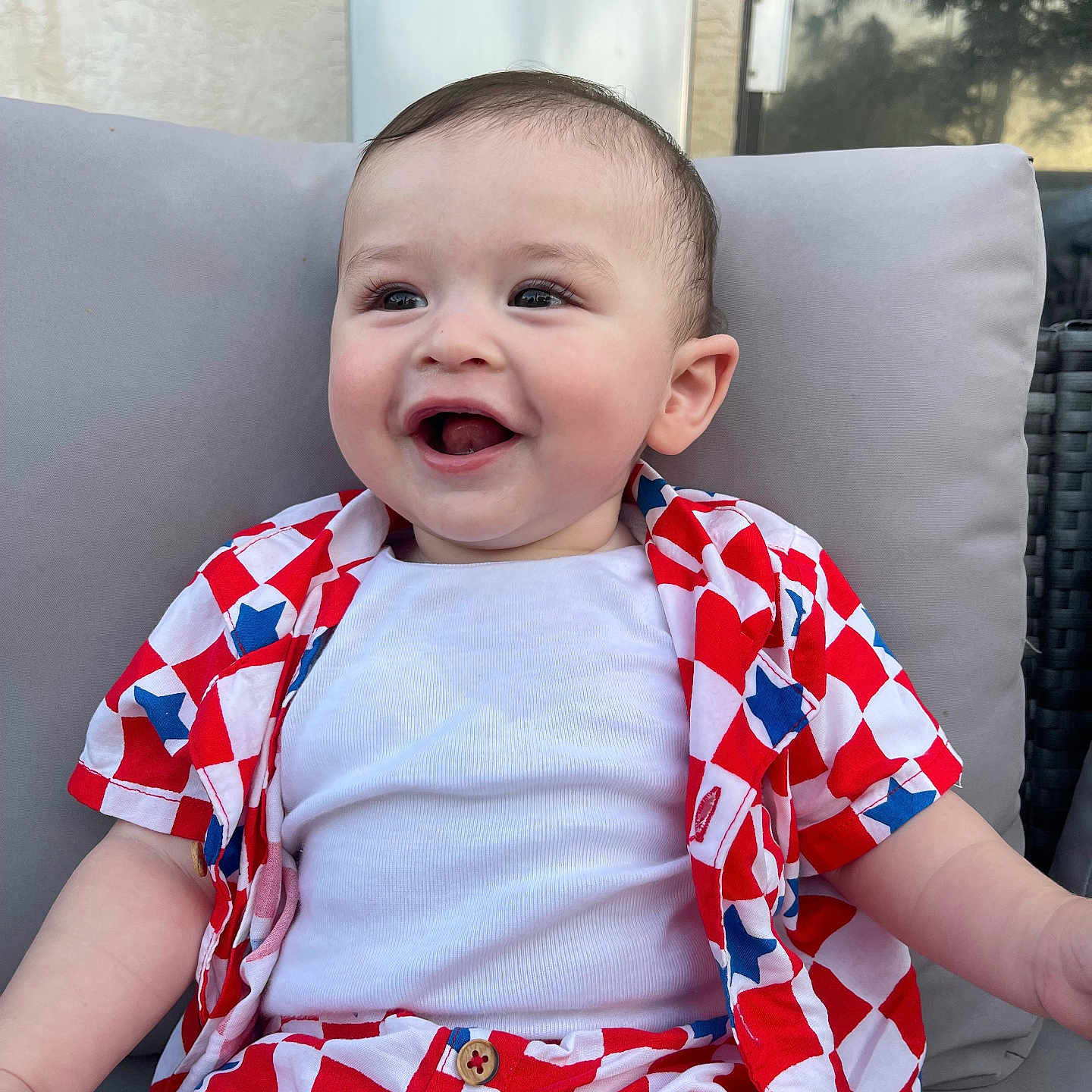 Mason joined the competition — help win amazing prizes! baby, babylaughing, chair, clothing, couch, dress, face, furniture, happy, head, homedecor, laughing, person, photography, plant, portrait, pottedplant, sitting, smile, t_shirt