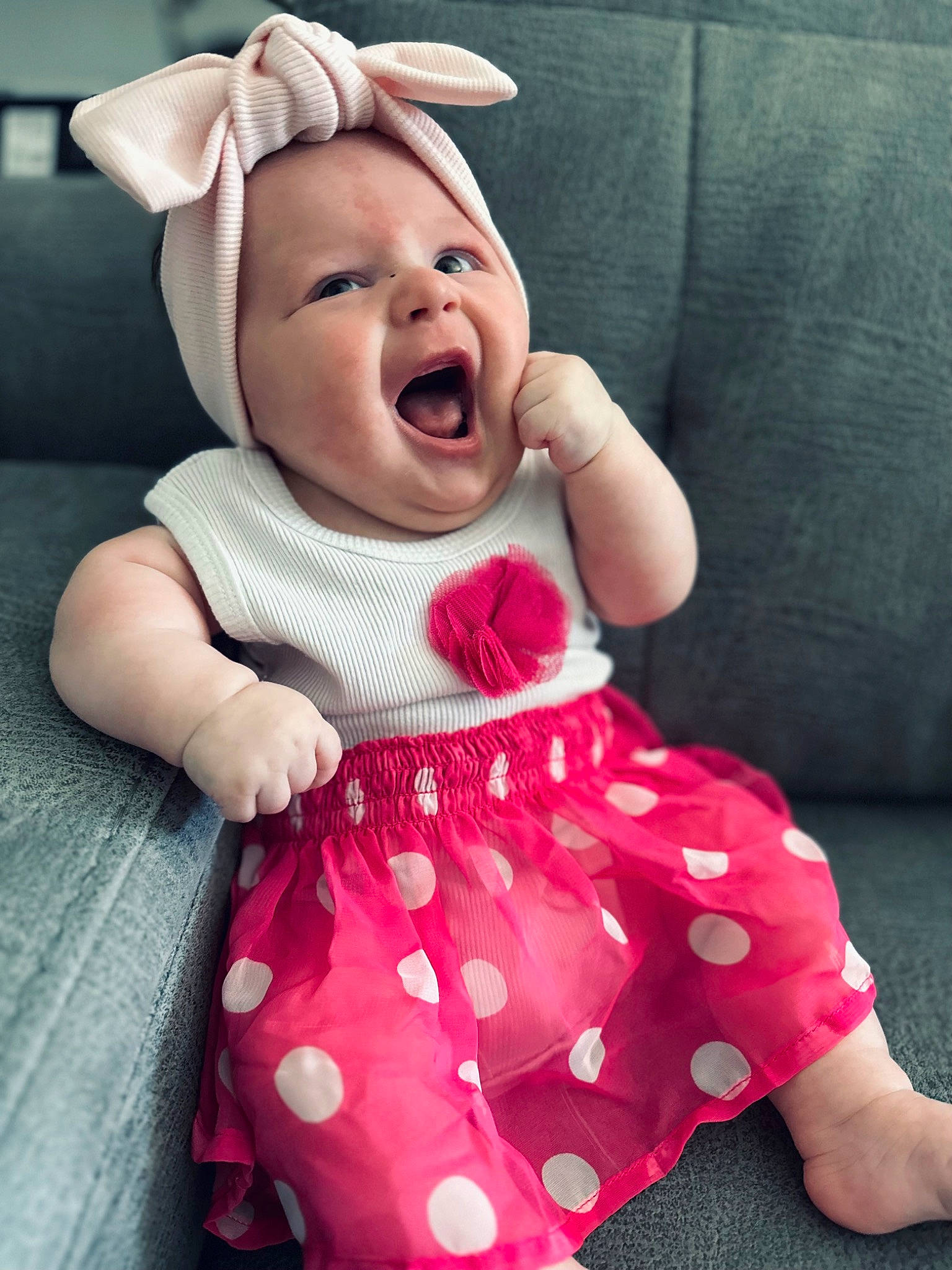 Georgia joined the competition — help win amazing prizes! baby, baby_toddler_clothing, cap, child, comfort, day_dress, gesture, happy, magenta, pattern, person, pink, play, sitting, skin, sleeve, smile, t_shirt, textile, thumb