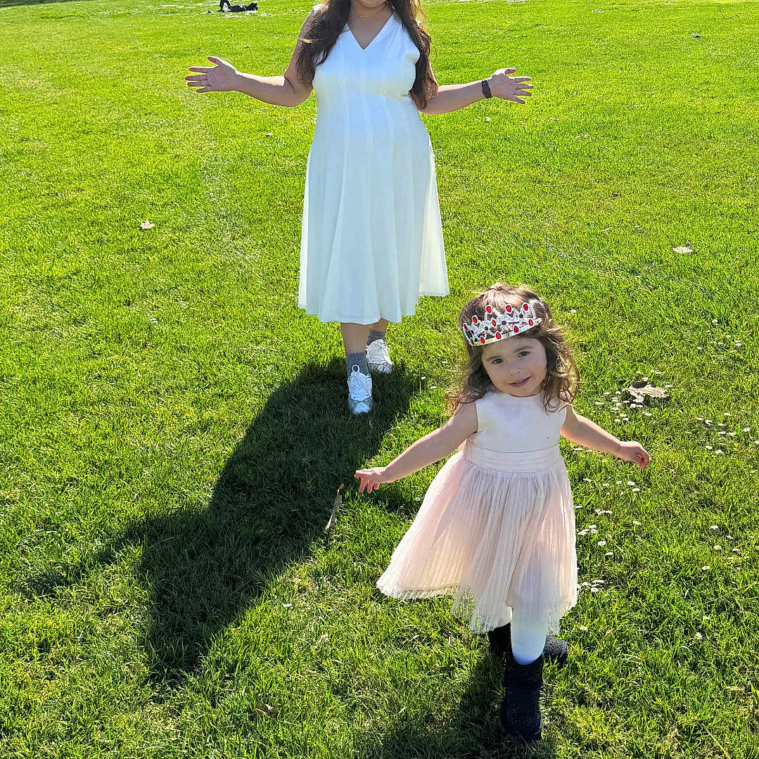 Zoe is registered to the contest to win money with this photo: child, clothing, dress, face, female, field, formalwear, girl, grass, grassland, head, lawn, nature, outdoors, park, person, photography, plant, portrait, skirt