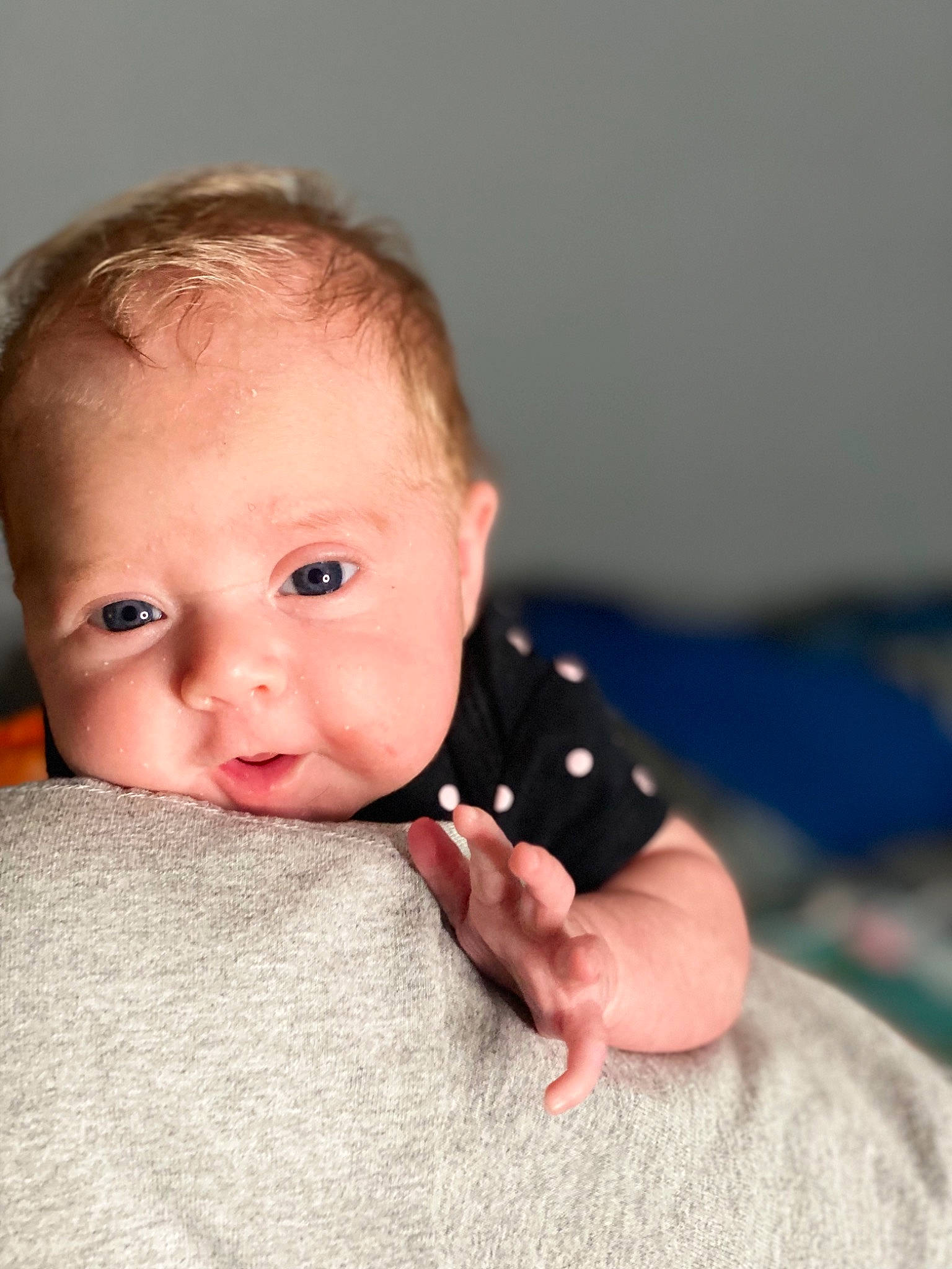 Kodi is registered to the contest to win money with this photo: baby, baby_toddler_clothing, cheek, child, collar, comfort, eyelash, flash_photography, happy, iris, linens, lip, nose, pattern, person, portrait_photography, room, sitting, sleeve, toddler