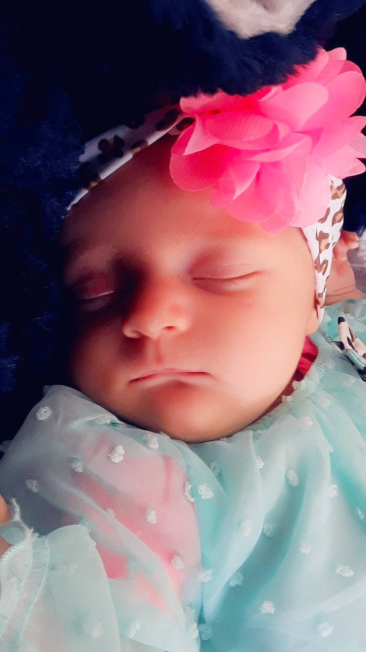 Aspen joined the competition — help win amazing prizes! beauty, cheek, child, eye, face, fun, girl, hair_accessory, head, headband, headgear, headpiece, human_hair_color, infant, lip, person, petal, pink, skin, smile