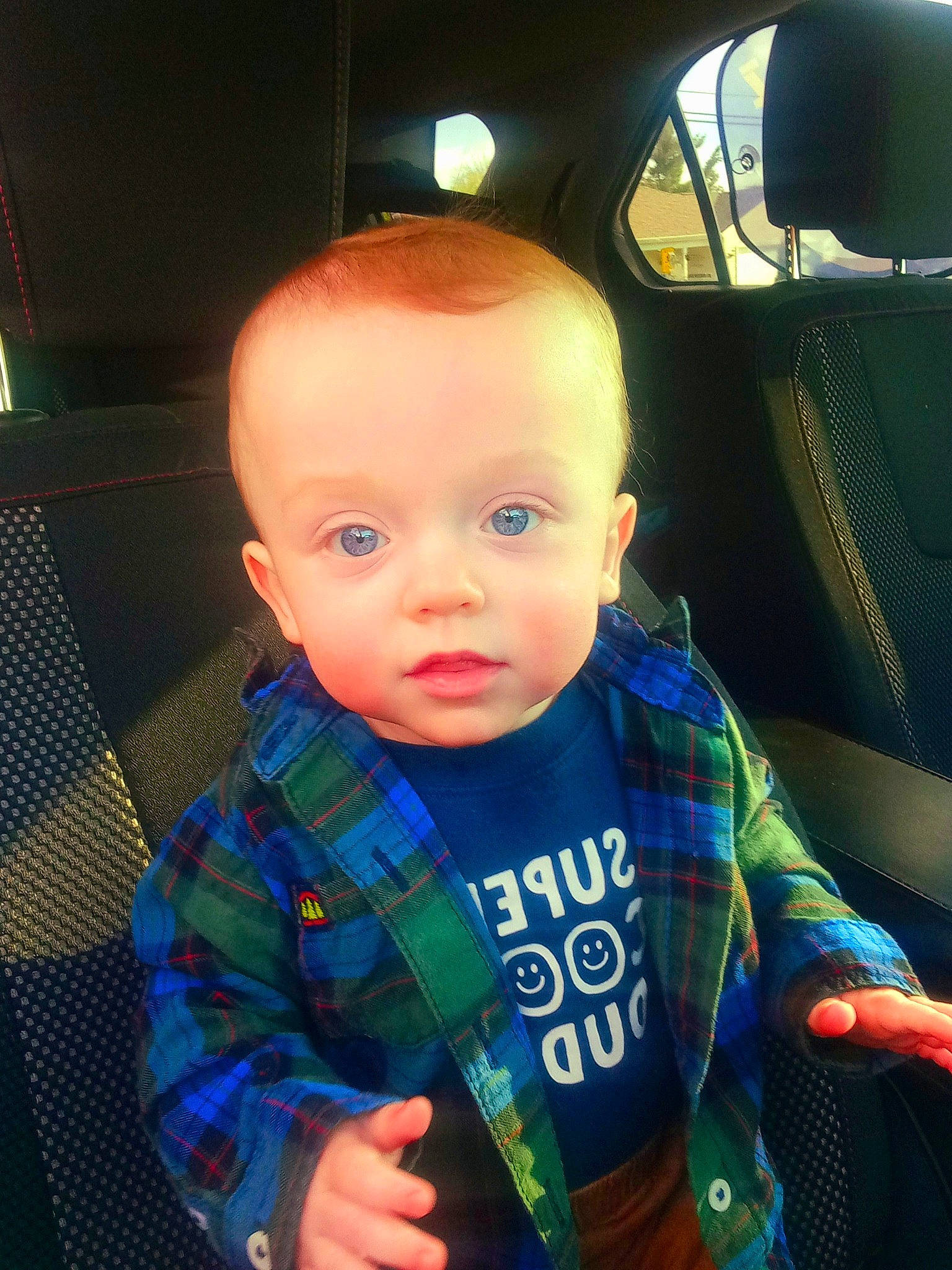 Oakley joined the competition — help win amazing prizes! auto_part, automotive_design, baby, baby_toddler_clothing, car_seat, car_seat_cover, child, electric_blue, family_car, fun, head_restraint, luxury_vehicle, pattern, person, plaid, sitting, sleeve, steering_wheel, t_shirt, toddler