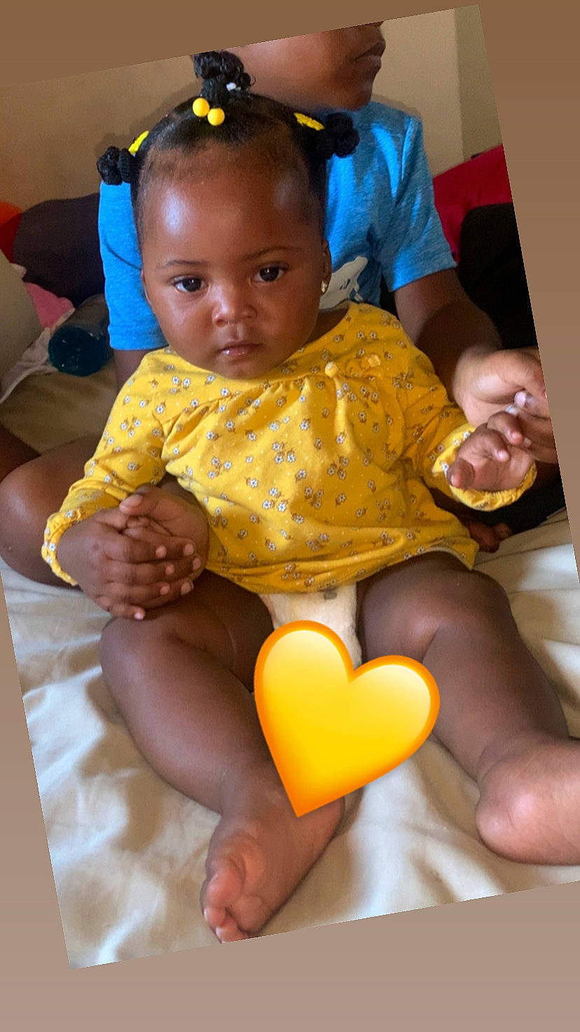 Kamira joined the competition — help win amazing prizes! arm, baby_toddler_clothing, chair, cheek, comfort, eye, finger, hairstyle, hand, head, joint, lap, leg, orange, organ, person, skin, sunglasses, thigh, toddler