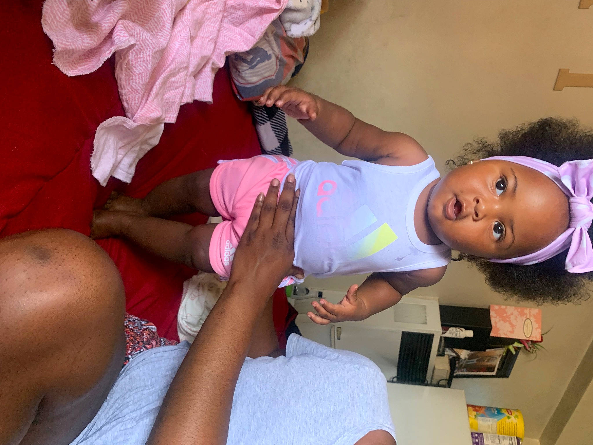 Kamira joined the competition — help win amazing prizes! abdomen, baby_toddler_clothing, child, comfort, elbow, event, finger, fun, gesture, happy, hat, human_leg, nail, person, pink, shorts, smile, t_shirt, thigh, toddler