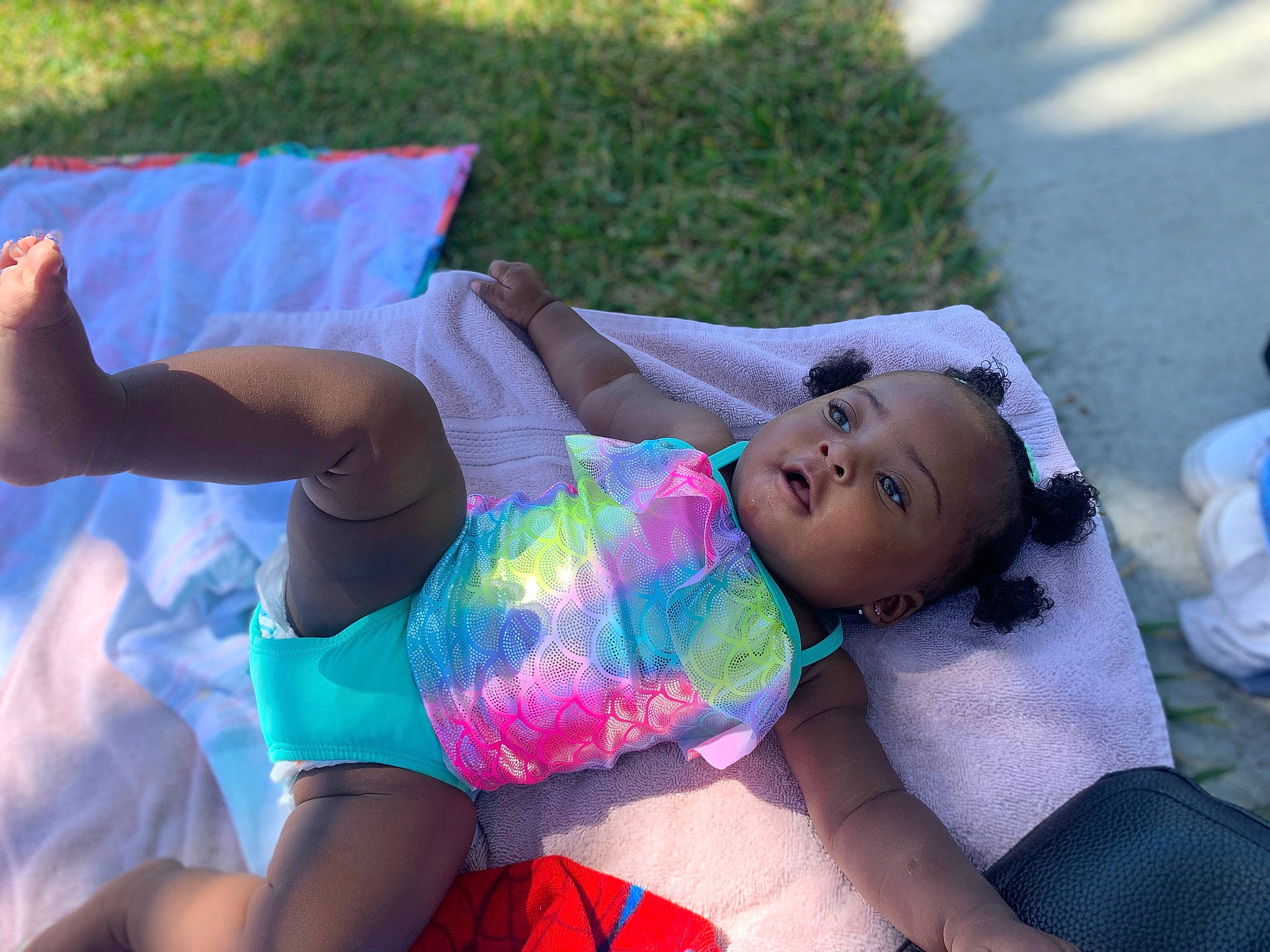 Kamira is registered to the contest to win money with this photo: abdomen, barechested, chest, fun, grass, happy, human_leg, knee, lap, leisure, people, person, recreation, shorts, sportswear, swimwear, thigh, toddler, trunk, underpants