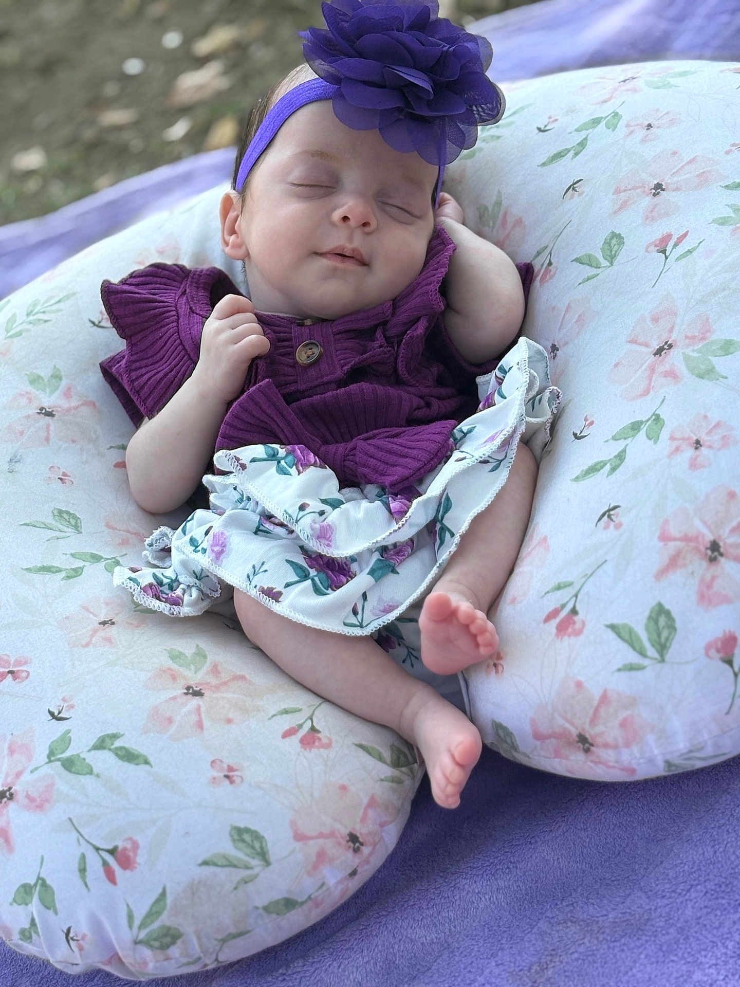 Paisley joined the competition — help win amazing prizes! baby, sleeping, purple_outfit, headband, flower, pillow, floral_pattern, blanket, infant, peaceful, skin, hand, foot, outdoor, nature, soft_texture, cute, portrait, relaxing, child