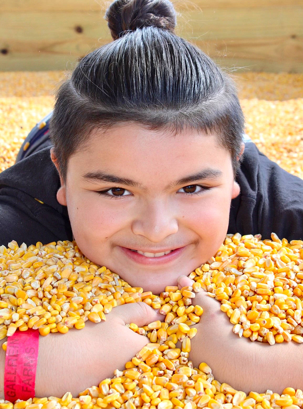 Josiyah is registered to the contest to win money with this photo: beauty, child, close_up, cuisine, dish, event, fashion_accessory, flowering_plant, fun, happy, ingredient, joy, natural_foods, organ, people_in_nature, person, plant, smile, snack, superfood