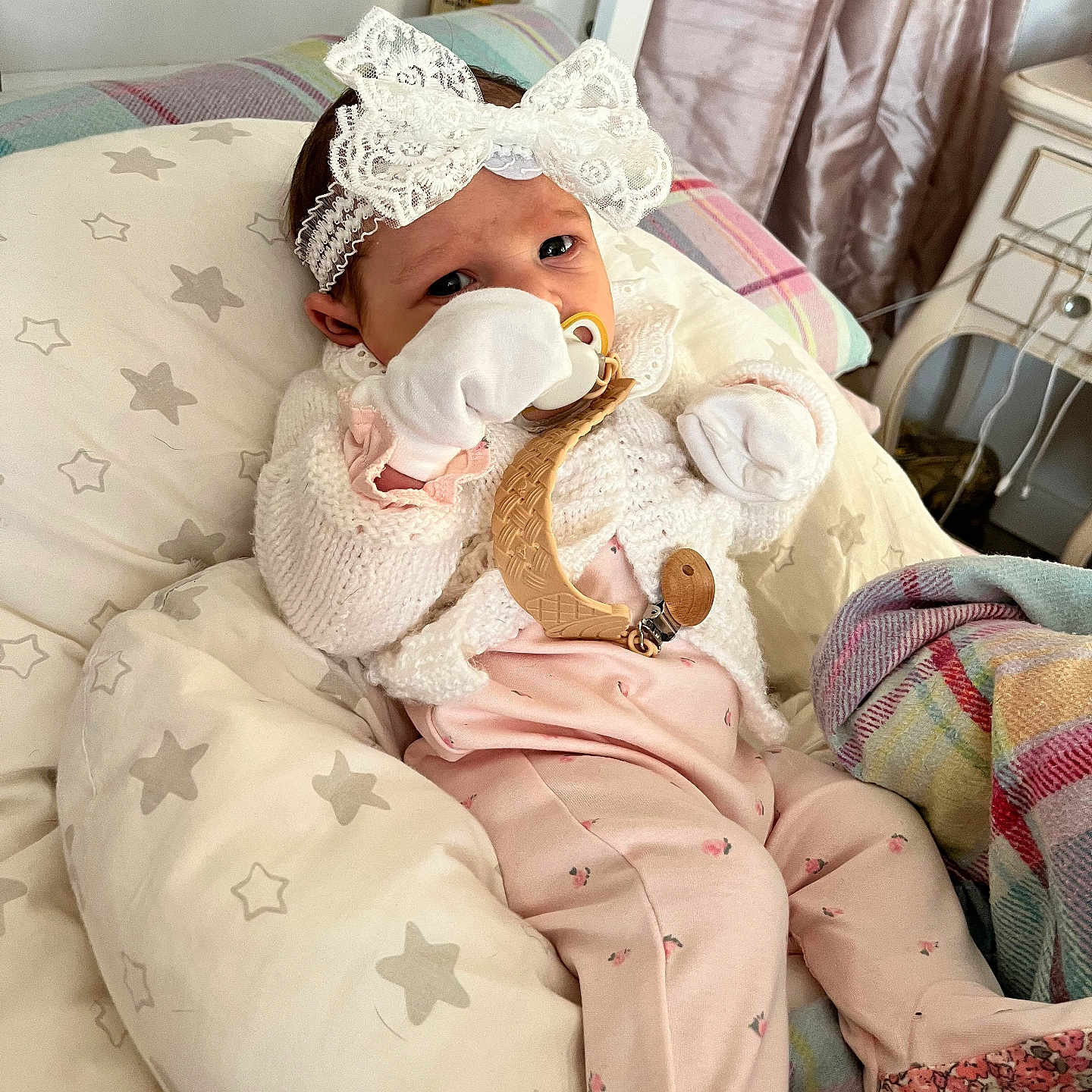 Aoife is registered to the contest to win money with this photo: baby, blanket, child, comfort, cushion, cute, headband, indoor, infant, knitted, lace, newborn, pacifier, pajamas, pink, portrait, resting, soft, stars, white