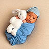 Junior joined the competition — help win amazing prizes! baby, infant, blue_blanket, blue_cap, plush_bunny, soft_toy, wrapped, cute, sleepy, portrait, cozy, newborn, child, cuddly, comfort, soft_texture, innocent, peaceful, lying_down, studio_photo