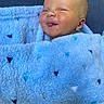 Charlie joined the competition — help win amazing prizes! baby, smiling, blue_blanket, fluffy, face, cheeks, tongue, happy, infant, cute, cozy, wrapped, child, newborn, skin, head, person, portrait, warm, soft