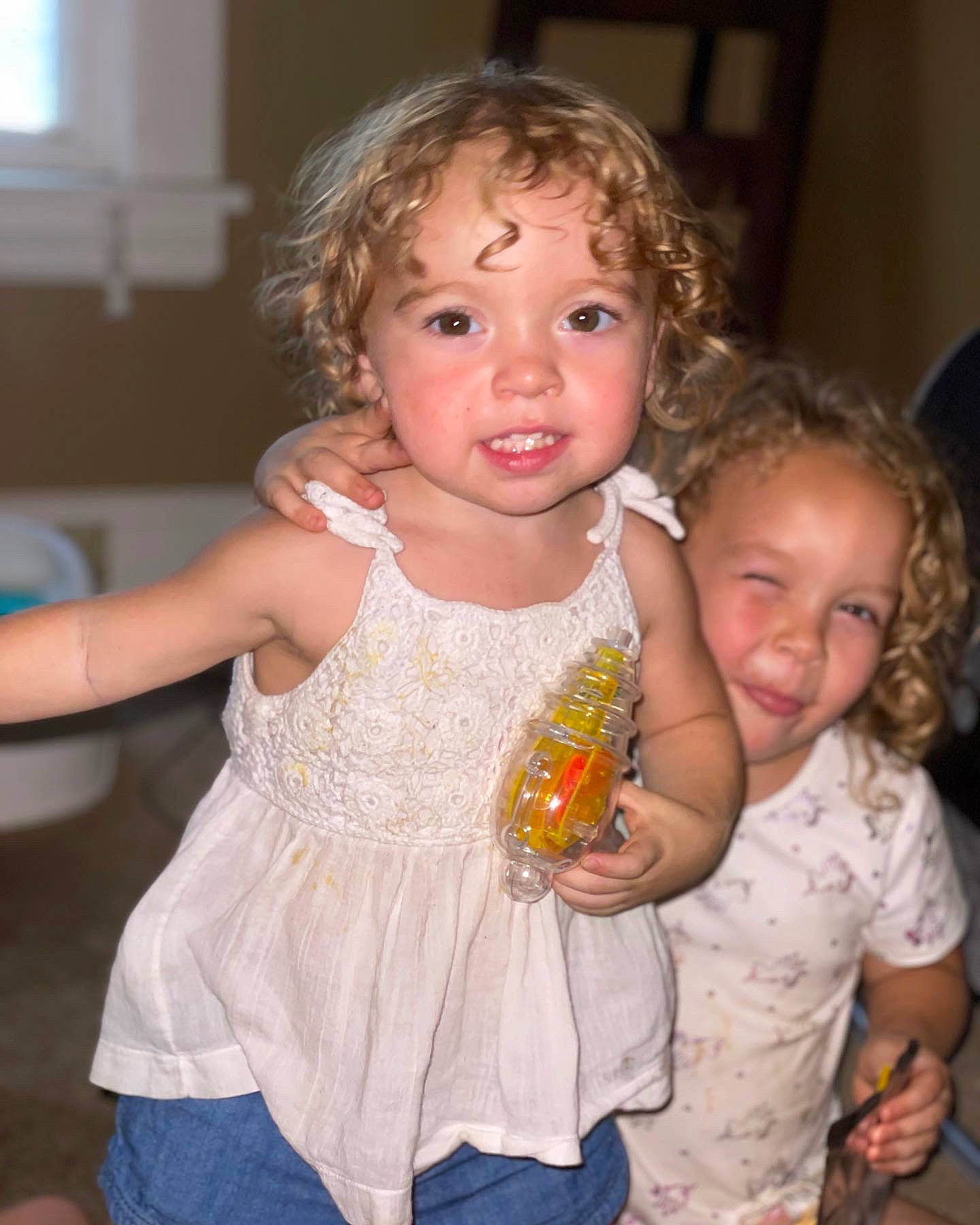 Kinley joined the competition — help win amazing prizes! baby_toddler_clothing, cheek, clothing, dress, eye, face, facial_expression, hair, hairstyle, head, human, human_body, iris, joint, lip, mouth, neck, nose, person, shoulder