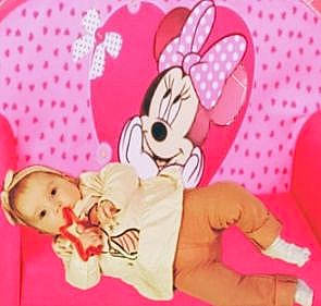 Liyannah participe au concours pour gagner de l'argent avec cette photo : art, baby, baby_toddler_clothing, baby_toys, fawn, font, happy, linens, magenta, pattern, person, pink, product, room, skin, smile, stuffed_toy, textile, toddler, toy