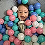 Ava joined the competition — help win amazing prizes! baby, child, bottle, milk, plastic_balls, pink_balls, blue_balls, white_balls, teal_balls, blanket, soft_texture, happy, smiling, face, infant, indoor, playtime, cute, person, toddler