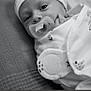 baby, infant, pacifier, blanket, hat, black_and_white, close_up, face, eyes, newborn, sleepwear, texture, portrait, cute, resting, soft_light, indoor, child, wrapped, calm