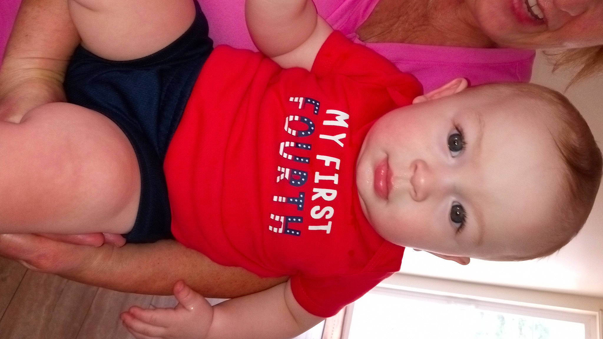 Jack is registered to the contest to win money with this photo: arm, baby, baby_products, baby_toddler_clothing, cheek, chest, child, elbow, eyelash, gesture, happy, joint, mouth, neck, nose, person, red, skin, sleeve, toddler