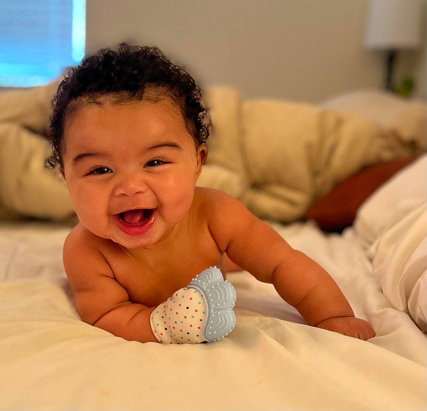 Kai is registered to the contest to win money with this photo: baby, baby_toddler_clothing, cheek, chin, comfort, eye, eyebrow, face, fun, happy, head, human_body, iris, mouth, neck, nose, person, skin, smile, thumb