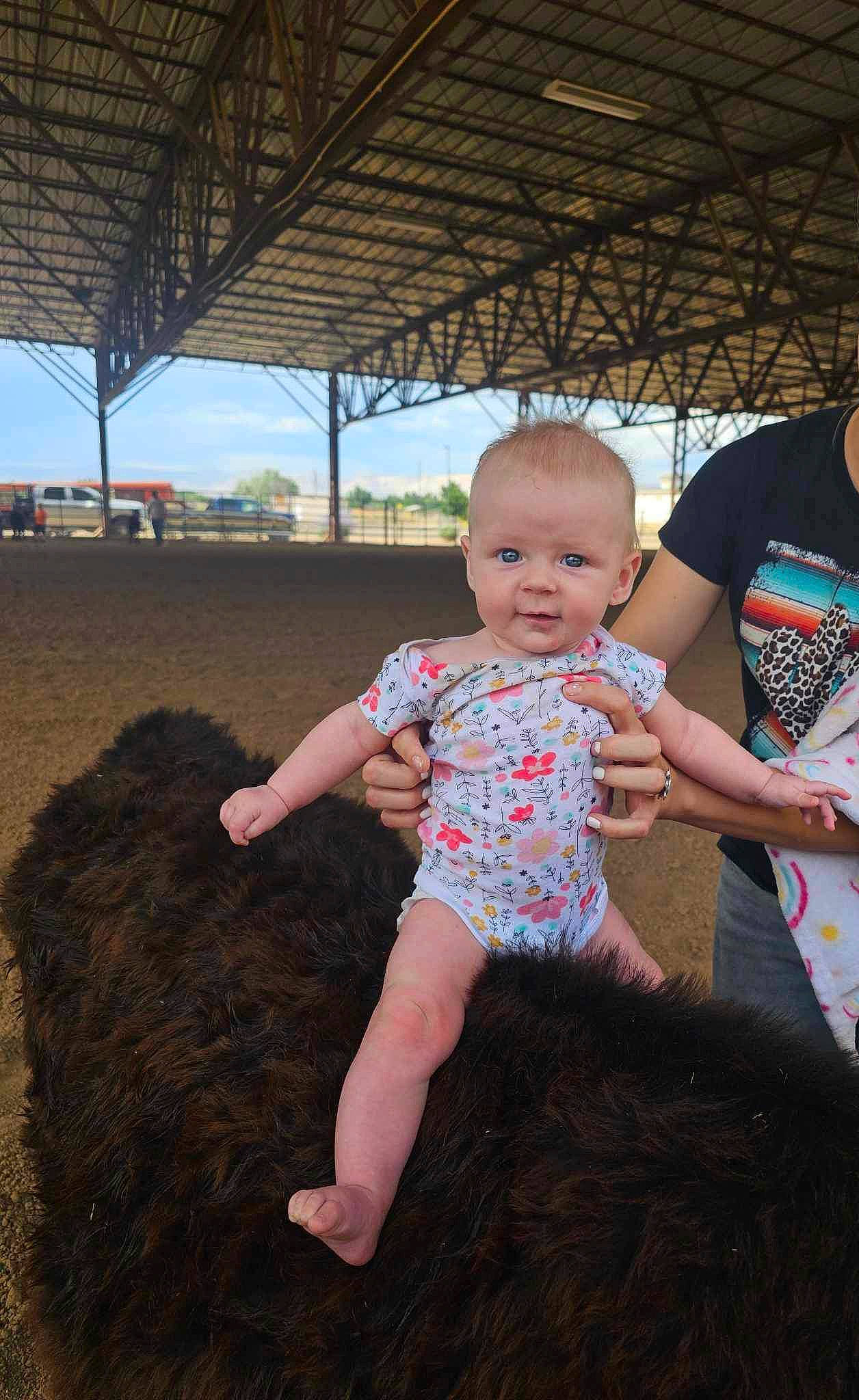 Oakland joined the competition — help win amazing prizes! baby, baby_toddler_clothing, barefoot, child, foot, fun, grass, happy, human_leg, leisure, people_in_nature, person, play, recreation, sitting, sky, soil, t_shirt, thigh, toddler