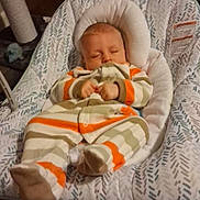 Brayden joined the competition — help win amazing prizes! baby, sleeping, onesie, baby_rocker, striped_clothing, footwear, sock, cartoon_character, indoor, cushion, infant, peaceful, child, wooden_floor, fabric, comfort, resting, hand, pajamas, head_support