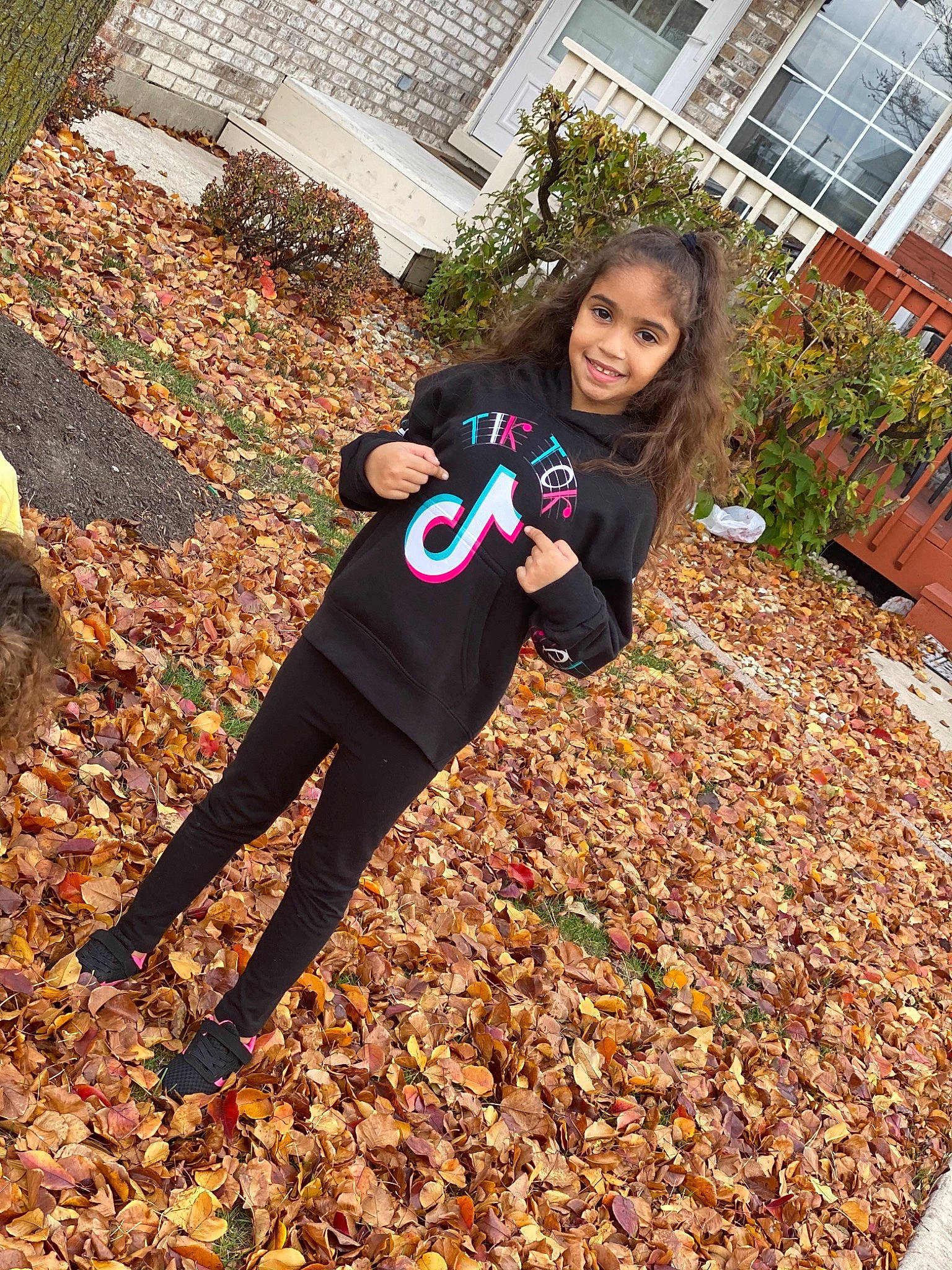 Ida joined the competition — help win amazing prizes! active_pants, autumn, boot, deciduous, joy, leaf, leggings, people_in_nature, person, street_fashion, window