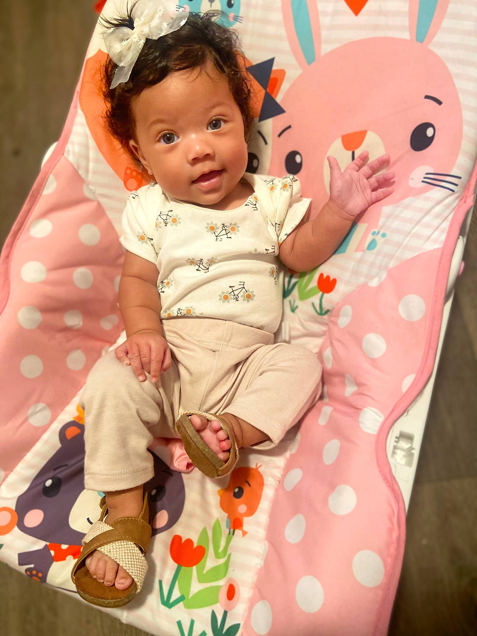 Namara is registered to the contest to win money with this photo: baby, baby_products, baby_toddler_clothing, cheek, child, comfort, costume, happy, linens, magenta, pattern, peach, person, pink, play, sitting, sleeve, textile, toddler