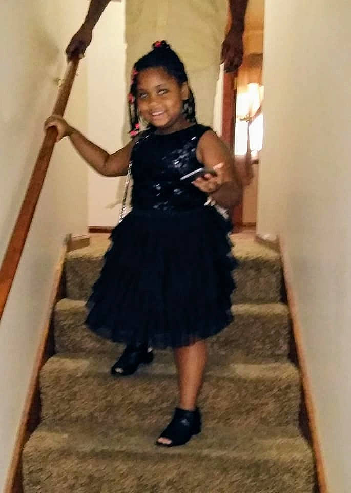 Ava is registered to the contest to win money with this photo: clothing, dress, joy, leg, little_black_dress, person