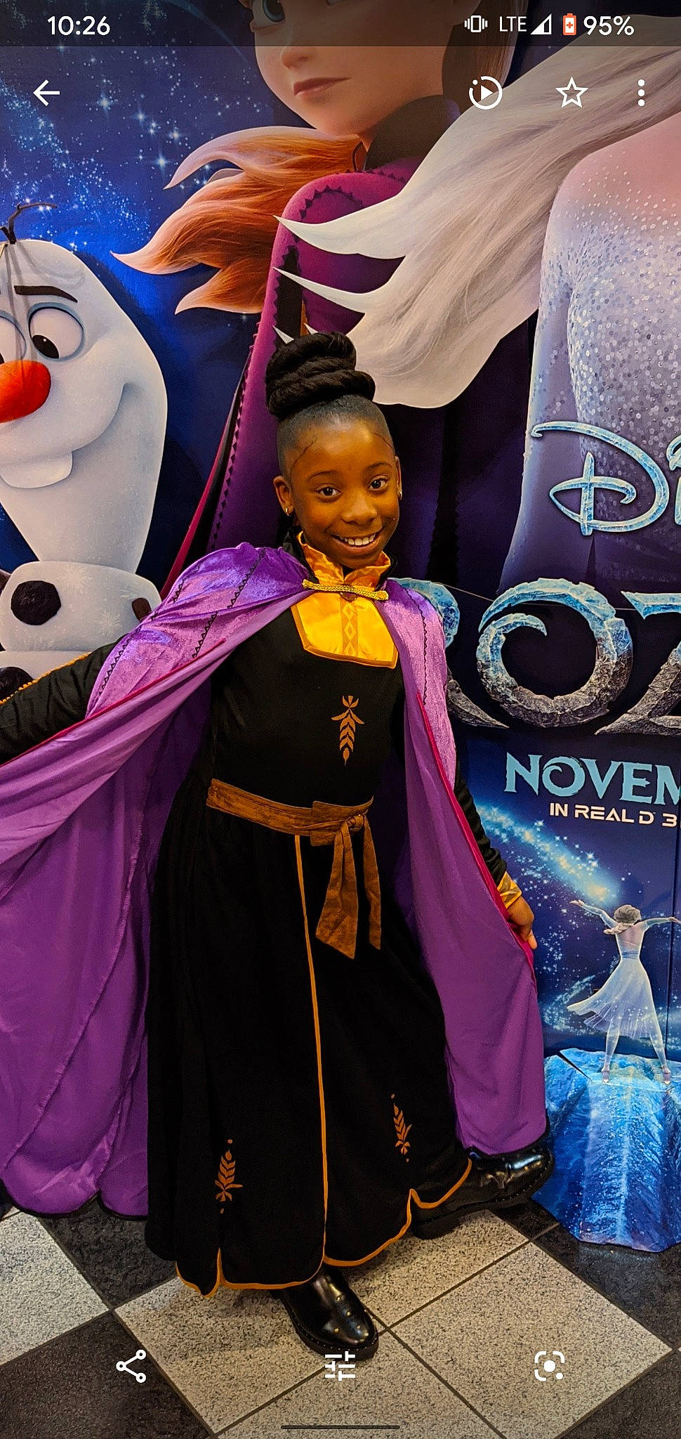 Nyjalah is registered to the contest to win money with this photo: costume, games, joy, outerwear, performance, person, purple, smile, world