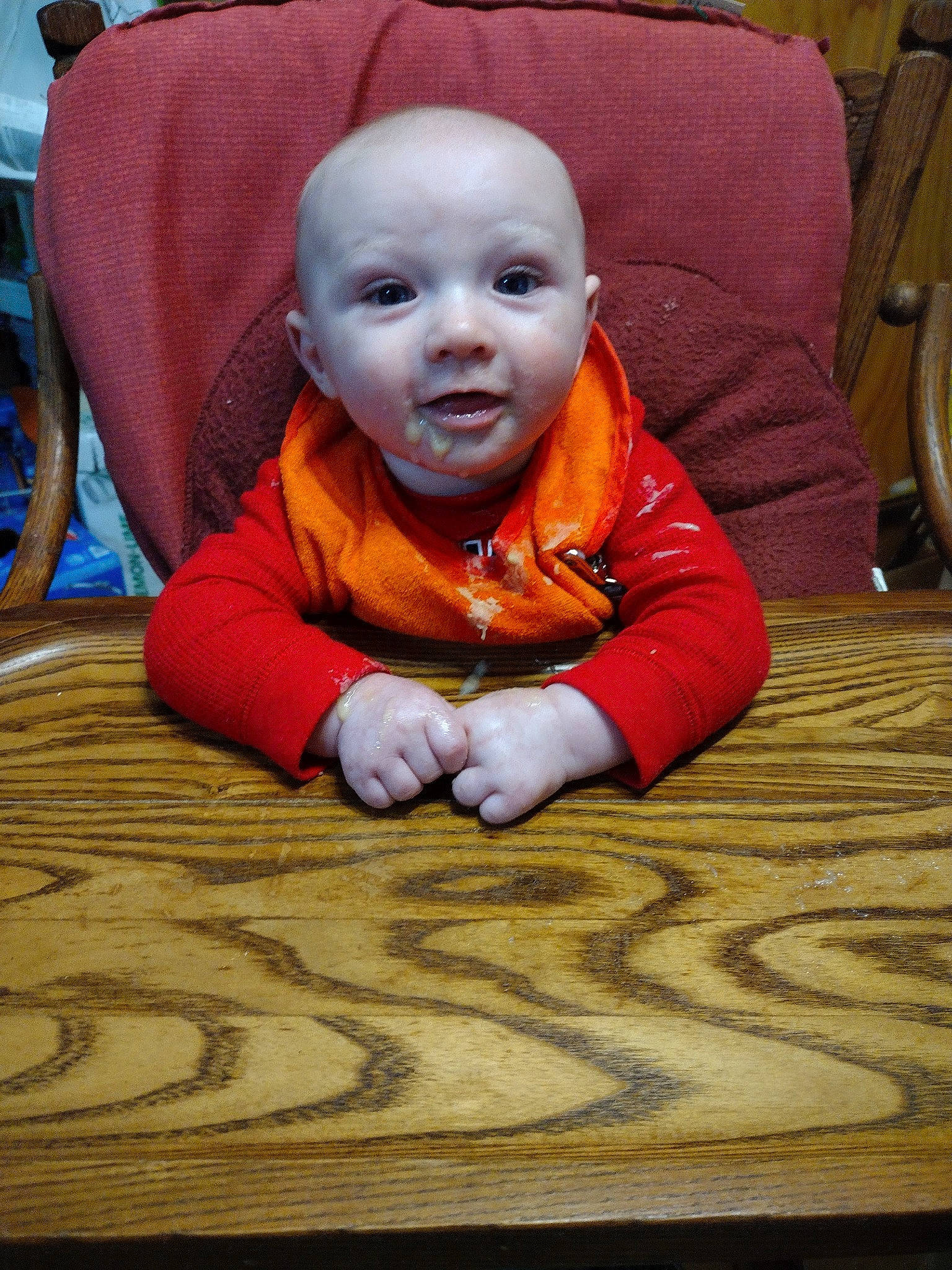 Donald is registered to the contest to win money with this photo: baby, cheek, child, comfort, crawling, floor, flooring, fun, grass, hairstyle, happy, hardwood, nose, person, plant, skin, smile, tire, toddler, wheel