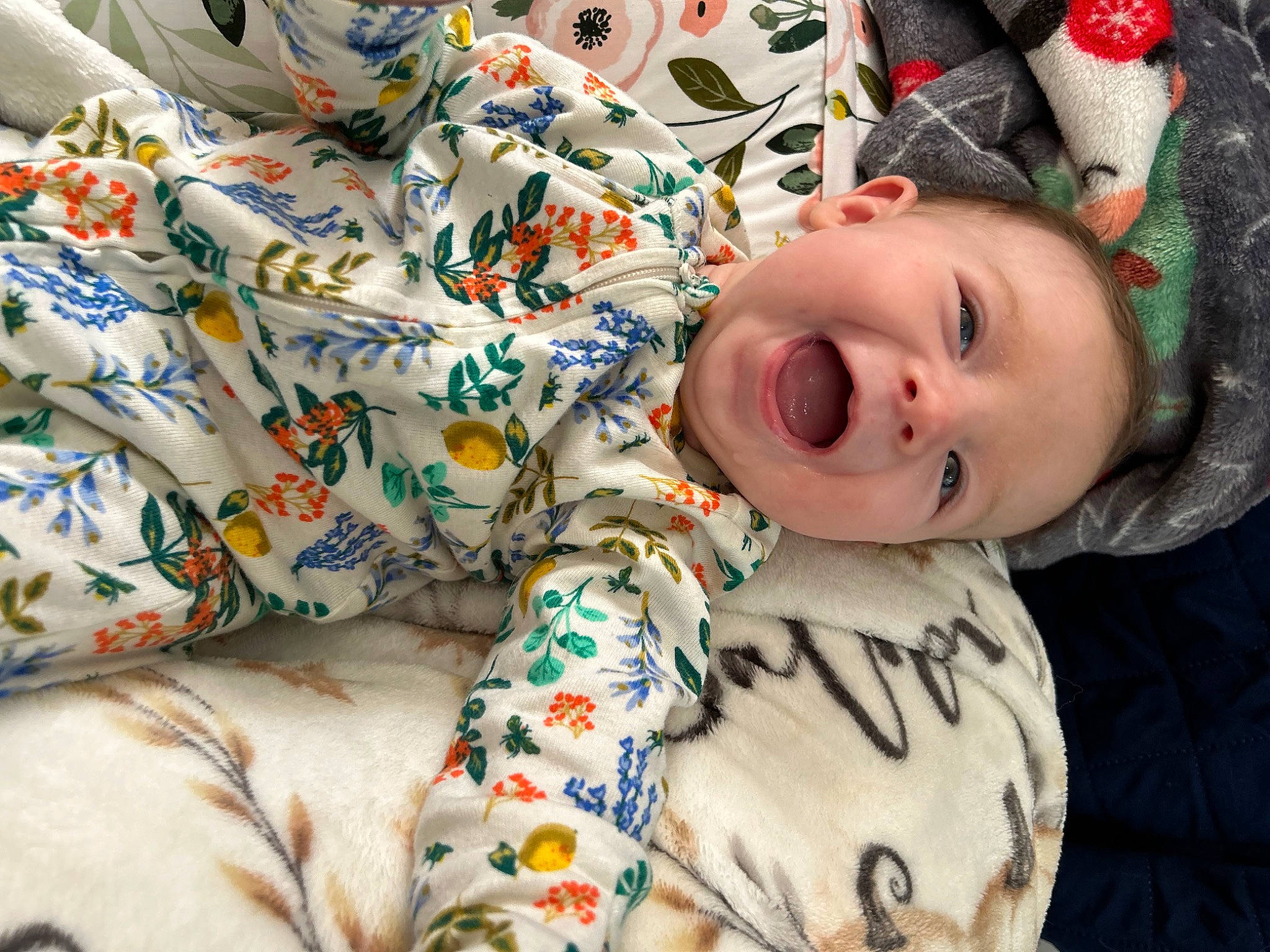 Audrey joined the competition — help win amazing prizes! baby, baby_toddler_clothing, cheek, child, comfort, fur, happy, linens, lip, nose, pattern, person, room, sitting, skin, sleeve, smile, t_shirt, textile, toddler
