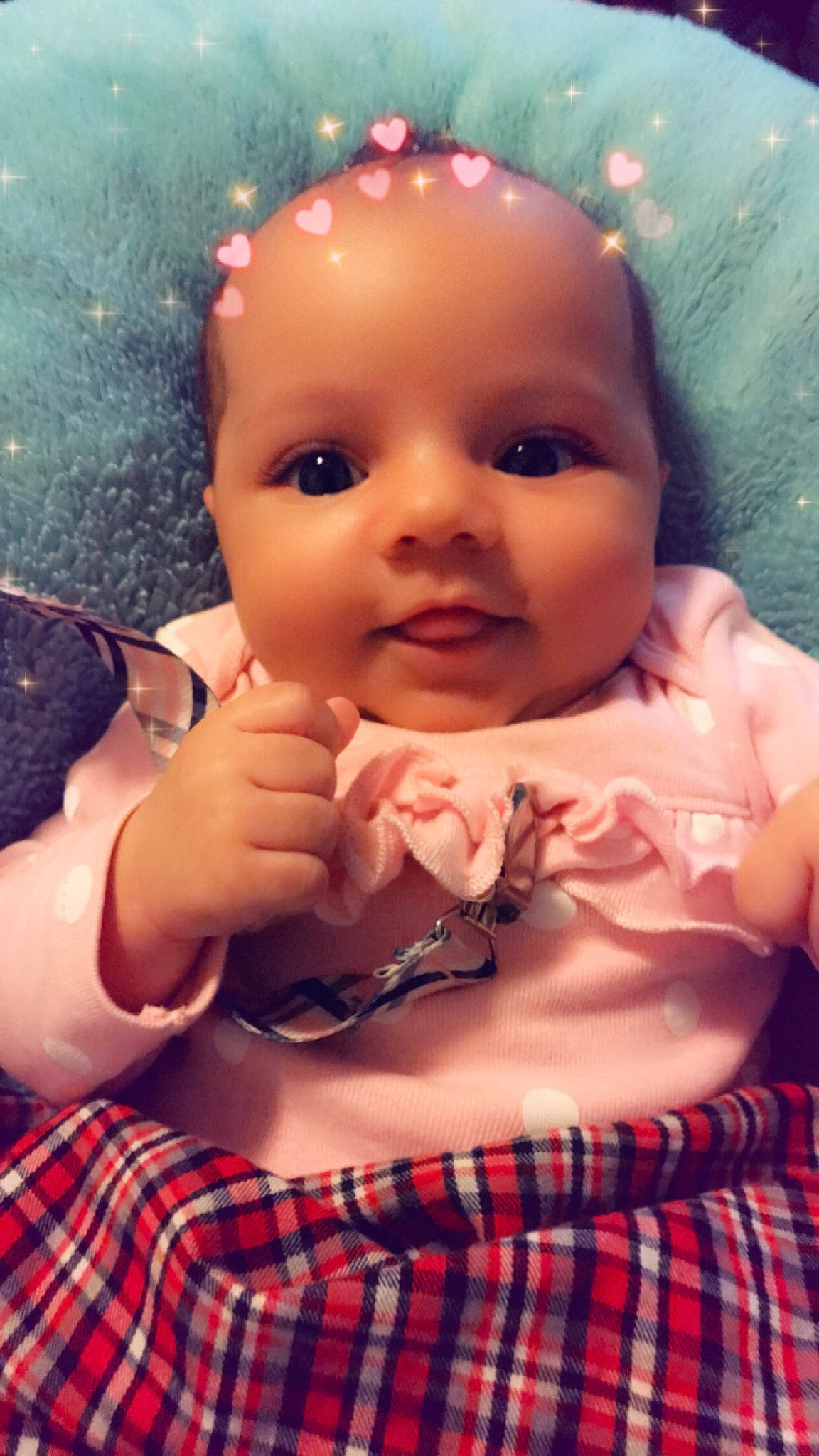 Emree is registered to the contest to win money with this photo: baby, cheek, child, design, eye, face, finger, forehead, hand, head, lip, mouth, muscle, nose, pattern, person, pink, skin, smile, thumb