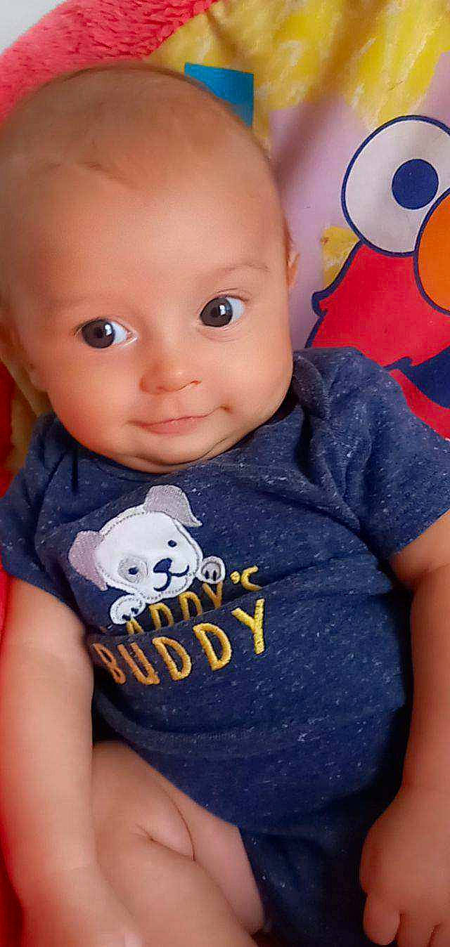 Hezekiah is registered to the contest to win money with this photo: arm, azure, cheek, chin, eye, eyebrow, eyelash, facial_expression, forehead, hair, hairstyle, human, joint, lip, mouth, nose, outerwear, product, skin, smile