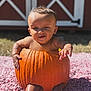 Akari-Reece is registered to the contest to win money with this photo: baby, child, pumpkin, autumn, outdoor, grass, carving, cute, seasonal, fall, sitting, orange, skin, expression, person, holiday, funny, nature, daylight, texture