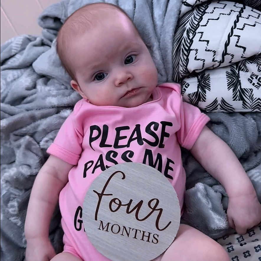 Willow is registered to the contest to win money with this photo: baby, bed, bedroom, blanket, clothing, cushion, face, furniture, hat, head, homedecor, indoors, newborn, person, photography, portrait, quilt, room, sitting, t_shirt