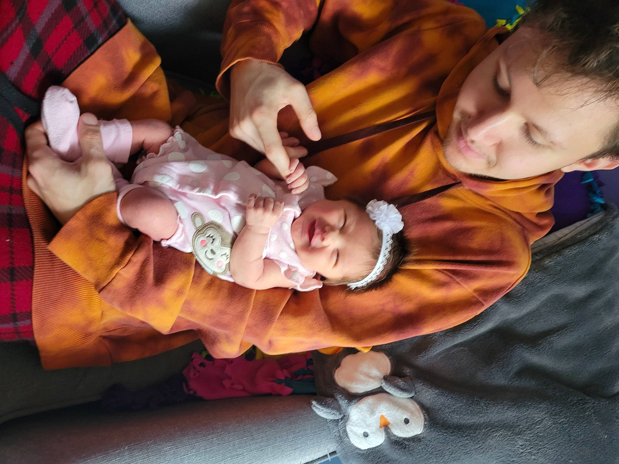 Mavis Rai is registered to the contest to win money with this photo: baby, baby_products, baby_toddler_clothing, child, comfort, event, finger, fun, hand, happy, head, headwear, lap, mammal, pattern, person, plaid, smile, tartan, toddler