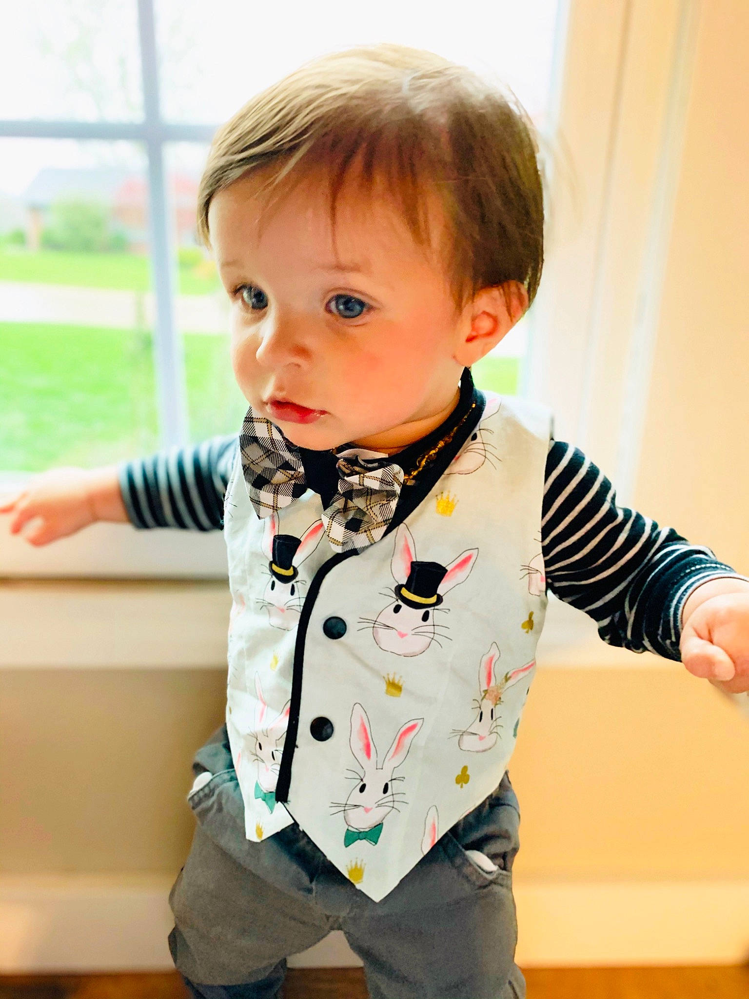 Krew is registered to the contest to win money with this photo: baby, baby_toddler_clothing, child, child_model, outerwear, person, play, sleeve, t_shirt, tie, toddler, top