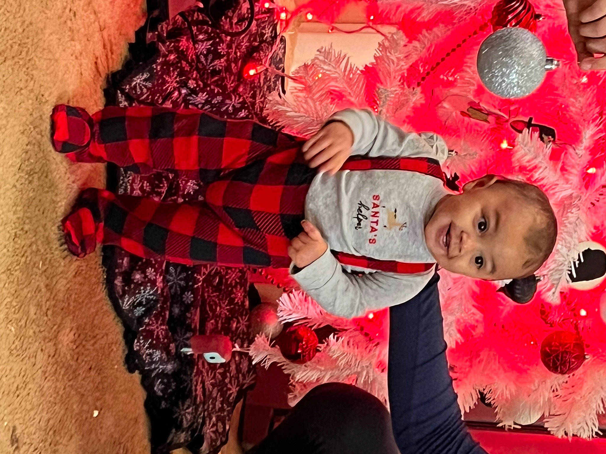 Kaylin is registered to the contest to win money with this photo: baby, beauty, christmas_eve, dress, event, fun, hairstyle, happy, holiday, pattern, person, pink, plaid, red, sleeve, smile, tartan, textile, toddler, tradition