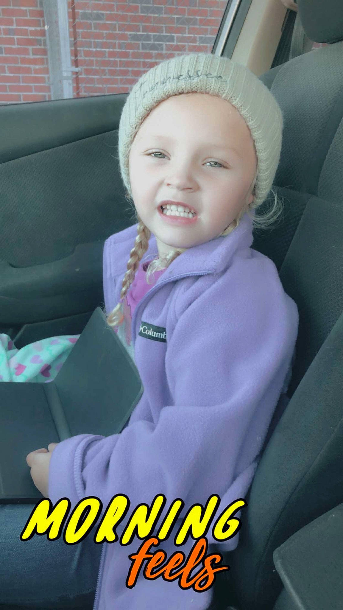 Ayvalee joined the competition — help win amazing prizes! auto_part, baby, car_seat, child, ear, forehead, happy, headgear, headwear, nose, person, photo_caption, skin, smile, toddler