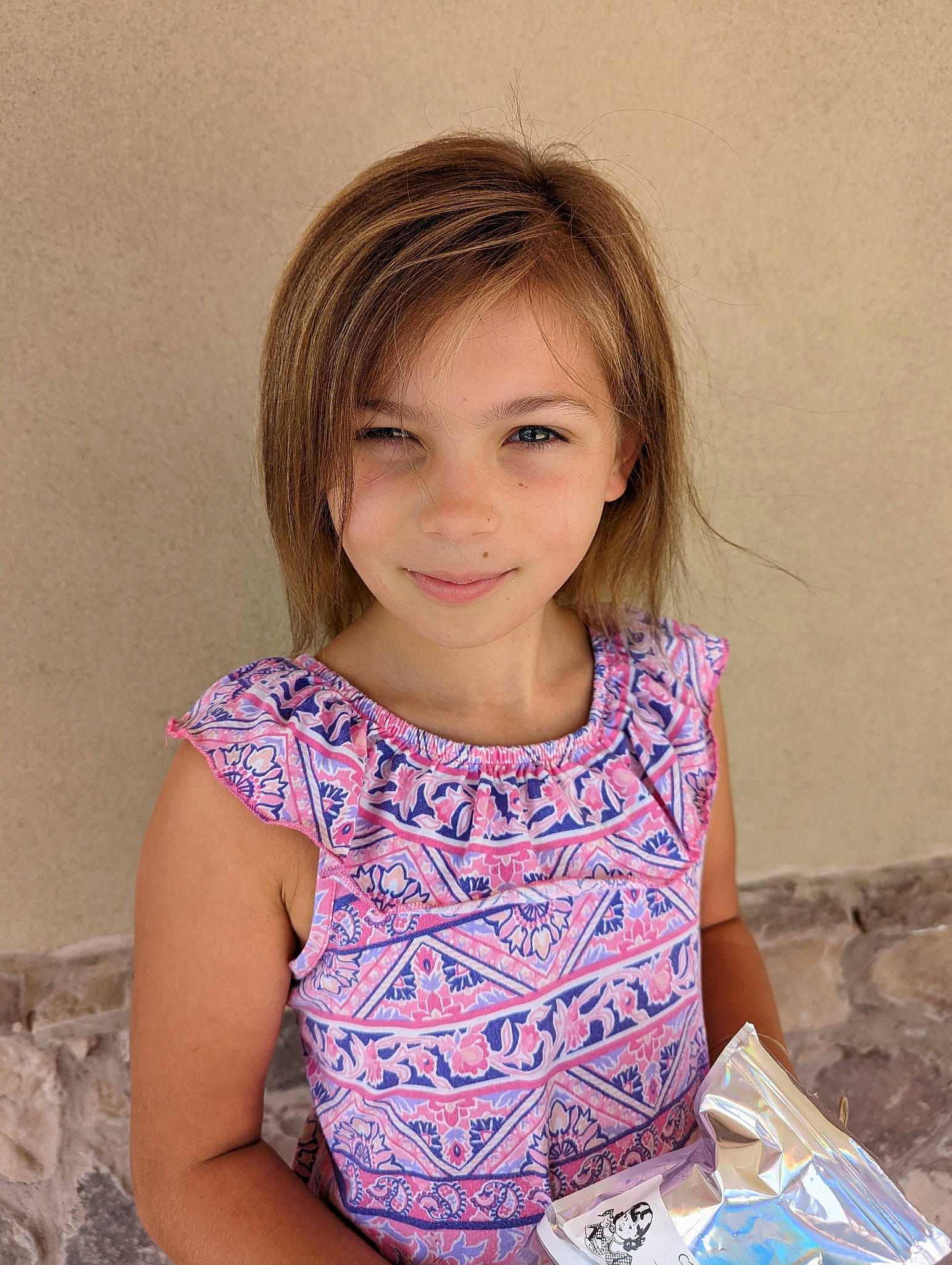 Braelynn is registered to the contest to win money with this photo: baby_toddler_clothing, beauty, brown_hair, cheek, child, dress, eyebrow, eyelash, fashion, fashion_design, flash_photography, hairstyle, happy, iris, joy, neck, person, sitting, skin, sleeve