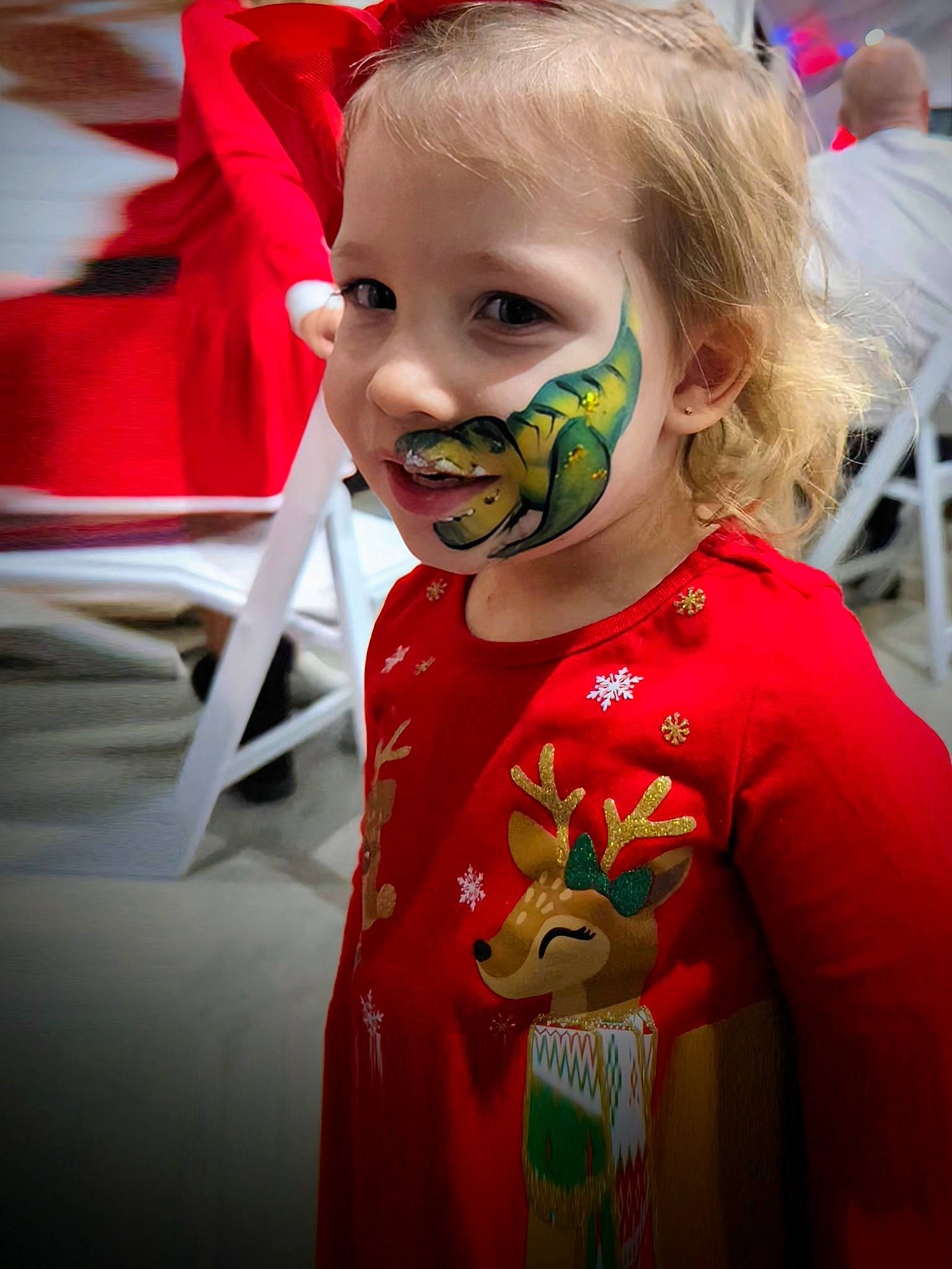 Jaycelynn is registered to the contest to win money with this photo: blond, chair, child, cool, costume, entertainment, event, eyelash, eyewear, facial_expression, fictional_character, fun, hair, happy, performing_arts, person, personal_protective_equipment, sleeve, smile, t_shirt