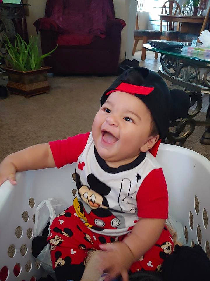 Isiah is registered to the contest to win money with this photo: baby, child, happy, party, person, smile, toddler, vacation