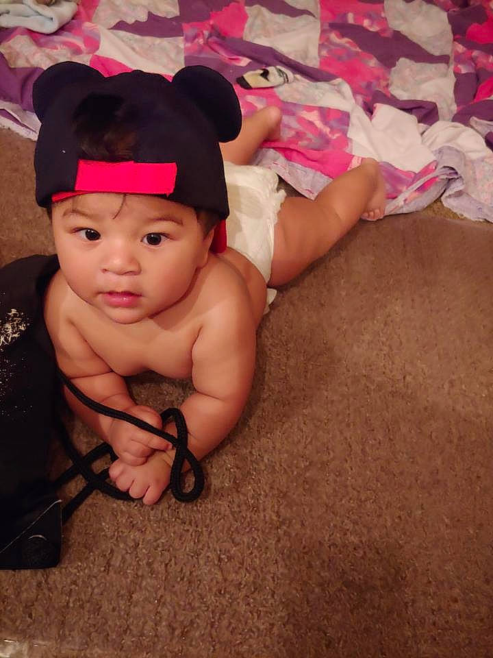 Isiah joined the competition — help win amazing prizes! baby, barechested, black_hair, cheek, chest, child, headgear, muscle, person, pink, skin, smile, toddler