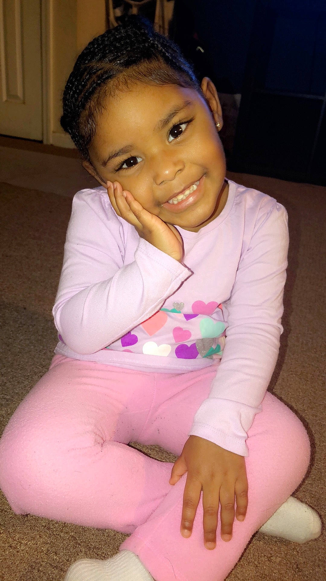 Lilah Shalynn is registered to the contest to win money with this photo: beauty, black_hair, cheek, child, day, eye, face, forehead, fun, girl, hairstyle, head, joy, leg, person, pink, purple, sitting, skin, smile