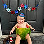Carter is registered to the contest to win money with this photo: baby, watermelon, hat, door, boots, stars, garland, smiling, sitting, patriotic, festive, outdoor, child, red, blue, white, barefoot, cute, holiday, summer
