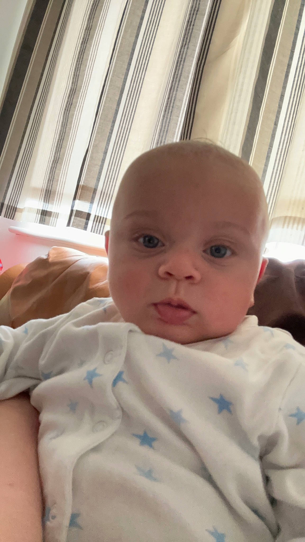 Enzo joined the competition — help win amazing prizes! baby, baby_toddler_clothing, cheek, child, comfort, curtain, fun, gesture, iris, linens, lip, nose, person, room, sitting, skin, thumb, toddler, window, window_treatment