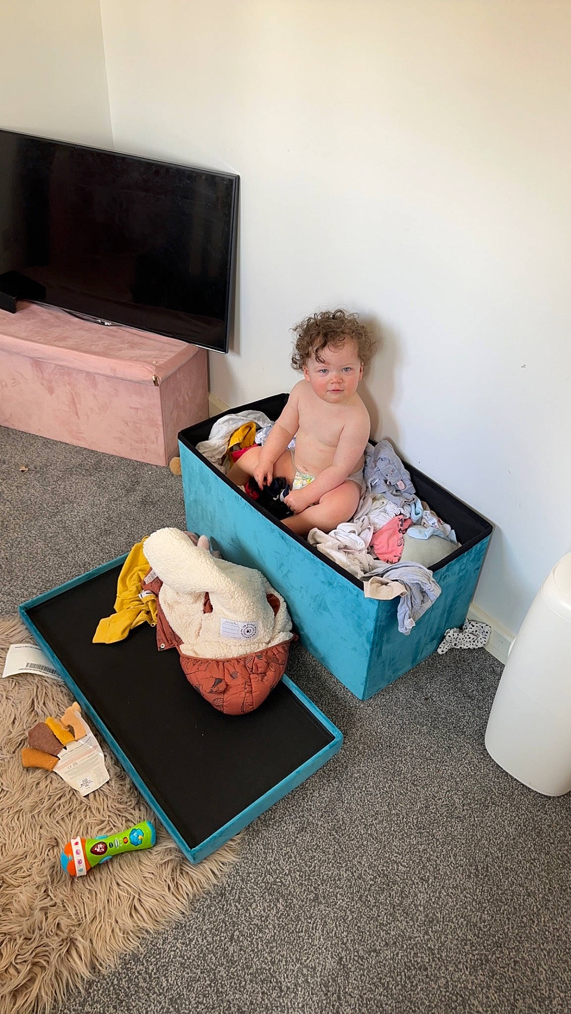 Sierra joined the competition — help win amazing prizes! baby, baby_products, baby_safety, baby_toddler_clothing, chair, child, comfort, diaper, flooring, foot, leisure, linens, living_room, person, play, room, sandal, sitting, television, thigh