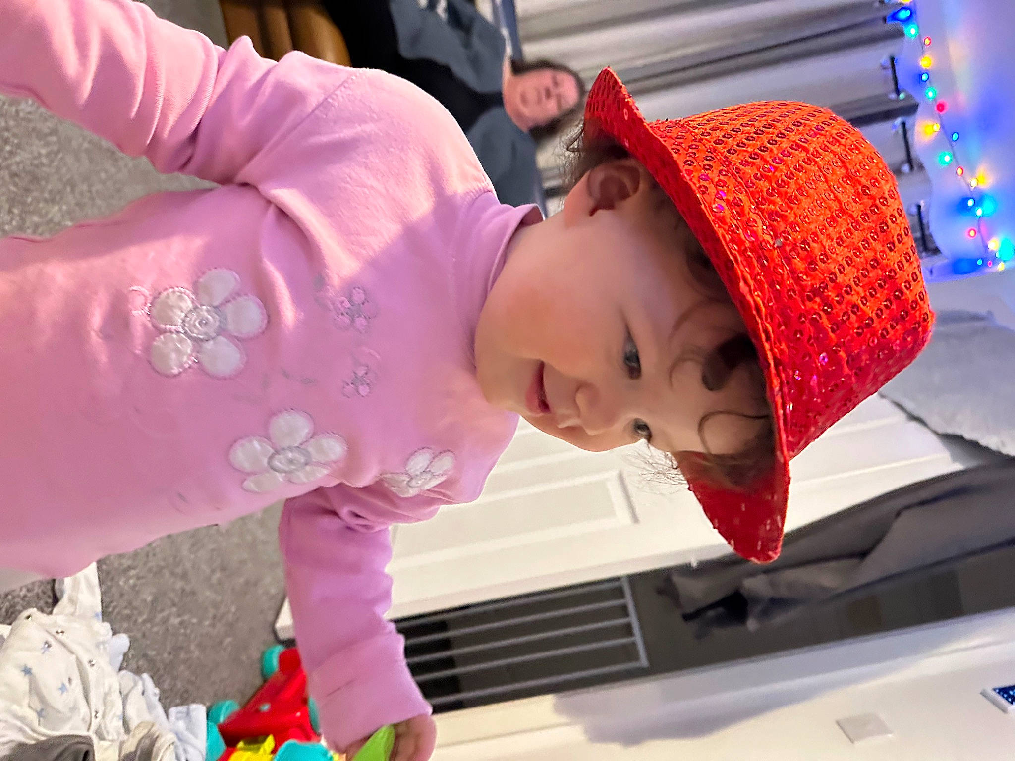 Sierra is registered to the contest to win money with this photo: baby, baby_toddler_clothing, blue, child, costume, event, fun, happy, hat, headwear, leisure, magenta, pattern, person, pink, purple, red, sleeve, textile, toddler