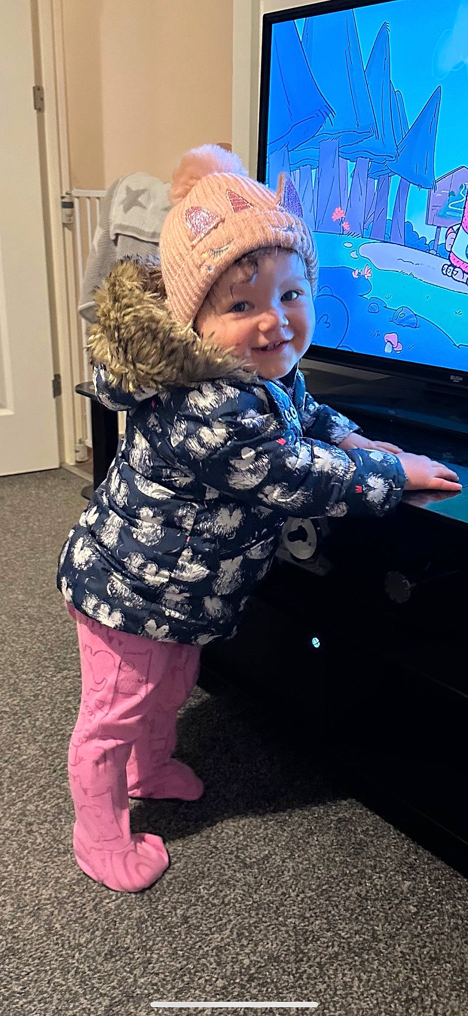 Sierra joined the competition — help win amazing prizes! baby, baby_toddler_clothing, cap, child, electric_blue, fashion_accessory, flooring, fun, fur, happy, headwear, joy, magenta, pattern, person, personal_protective_equipment, pink, purple, sleeve, smile