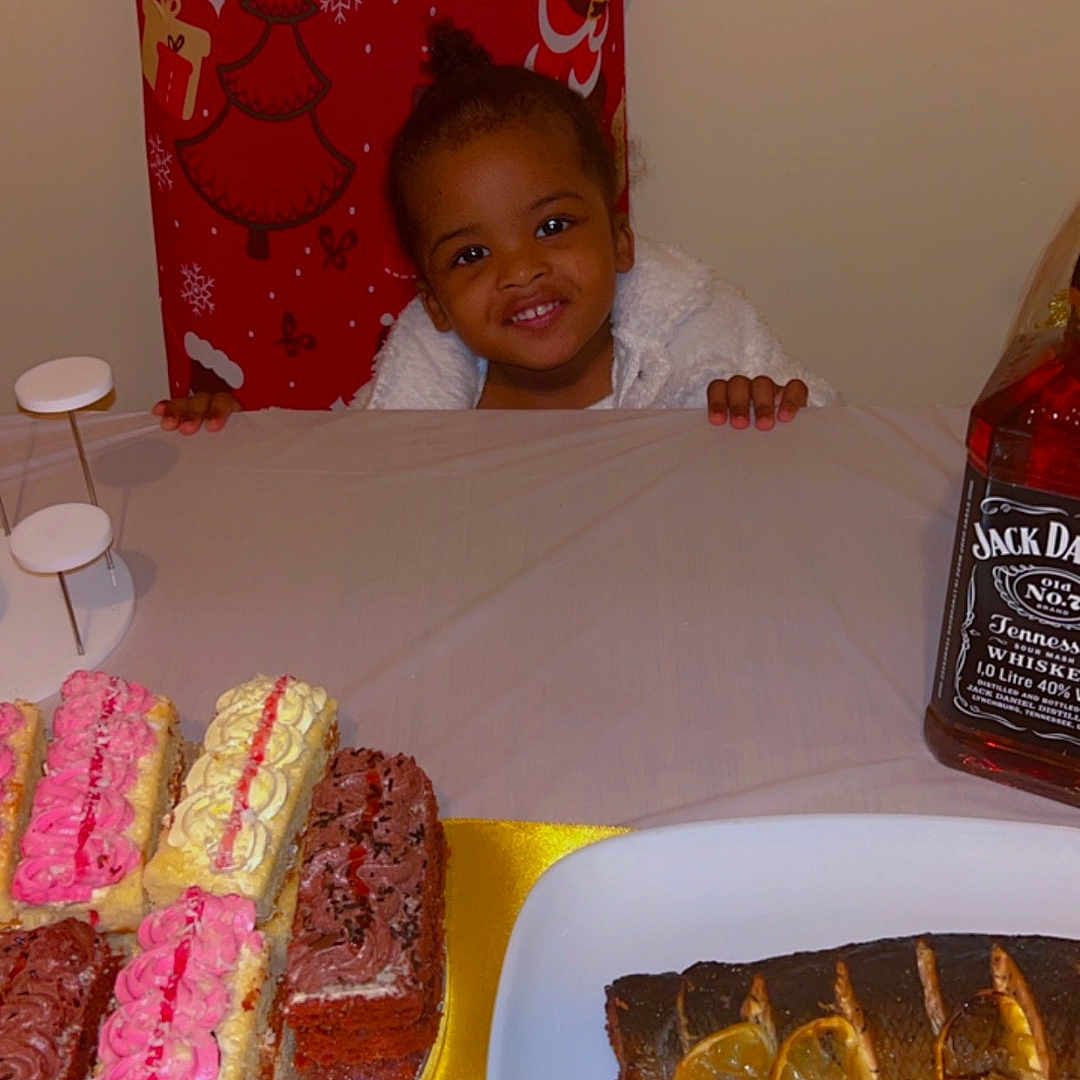 Grace joined the competition — help win amazing prizes! baby, birthdaycake, cake, couch, cream, dessert, diningtable, dish, face, food, fruit, furniture, head, icing, meal, person, photography, plate, portrait, table